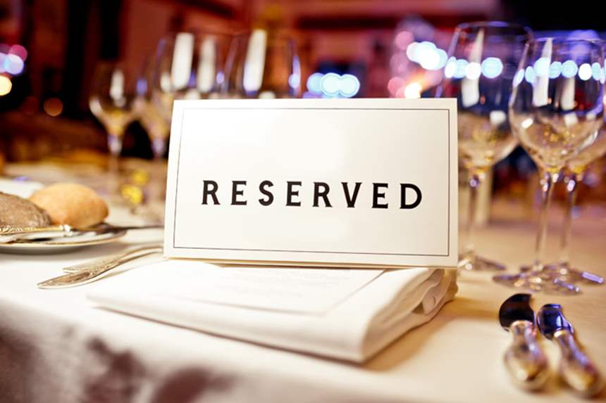 Table with a reservation sign 